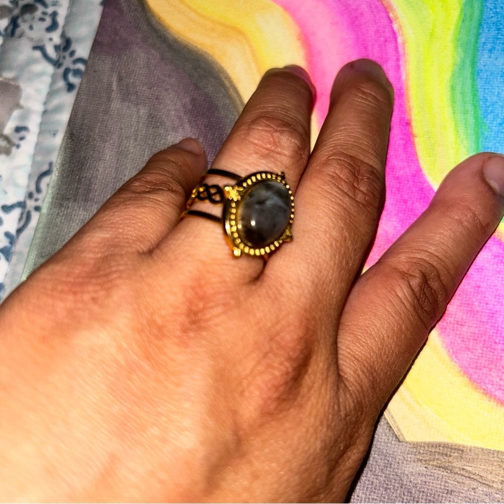 Elegant Gold and Black Ring